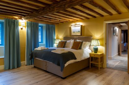 A super-king size bedroom at Parkview Farmhouse, Somerset