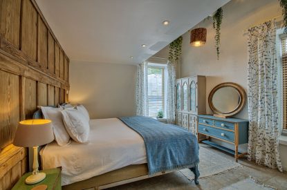 A super-king size bedroom at Olive Orchard, Cotswolds