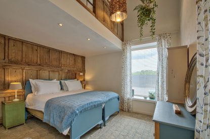 A super-king size bedroom at Olive Orchard, Cotswolds