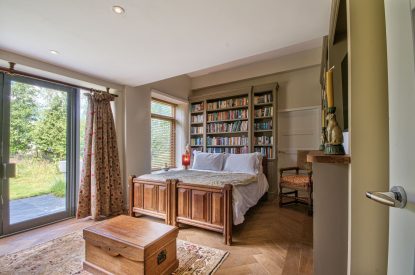 A super-king size bedroom at Olive Orchard, Cotswolds