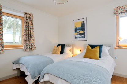 A twin bedroom at Garten Lodge, Highland