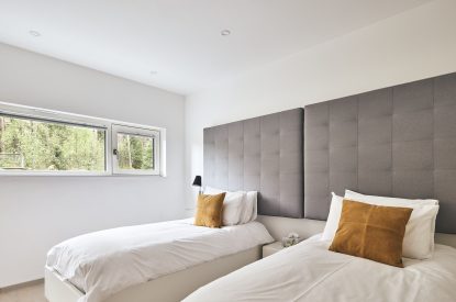 A twin bedroom at Stag Cabin, Loch Lomond