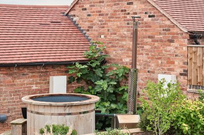 The wood-fired hot tub at Hay Bale Cottage, Worcestershire