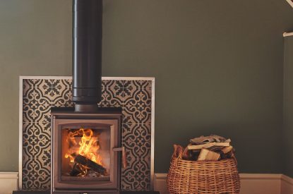 The wood-burning stove in the living room at Hay Bale Cottage, Worcestershire