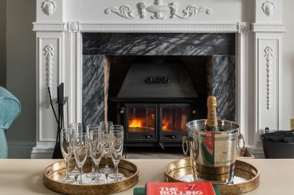 The living room with log burner at Kittiwake House, Devon