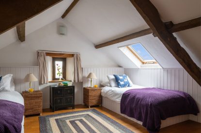 A twin bedroom at Valley View Barn, Devon