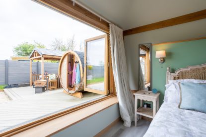 View of the hot tub and sauna at The Lodge at Leigh, Dorset