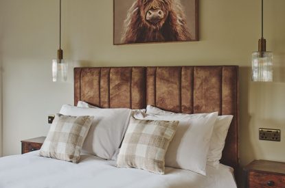 A king size bedroom at Rye Top Farm, Uppermill, Peak District
