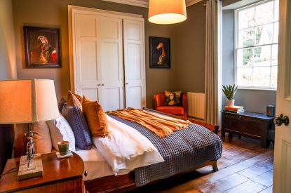 A super king size bedroom at Meadfoot Manor, Torquay, Devon