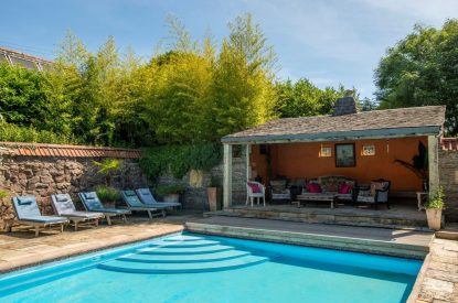 The heated outdoor swimming pool at Chulmleigh Manor, Devon