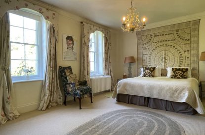A king size bedroom at Chulmleigh Manor, Devon