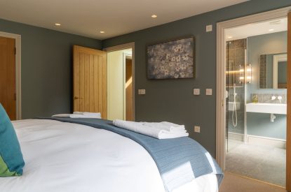 A super king sized bedroom at Poppy Cottage, Somerset