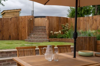 View to the wood fired hot tub at Poppy Cottage, Somerset