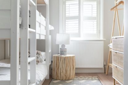 Triple bunk bedroom at Driftwood House, Dorset