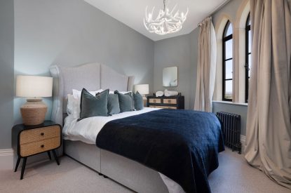 A king-size bedroom at Priory Lodge, Essex 