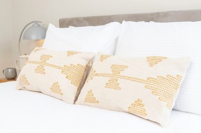 A king-size bedroom at Upper Riverside Mill, Lake District