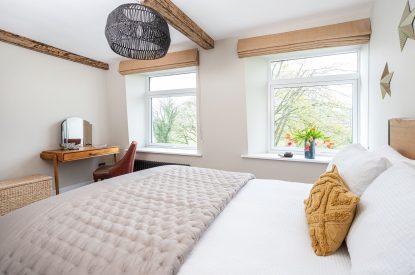 A king-size bedroom at Upper Riverside Mill, Lake District