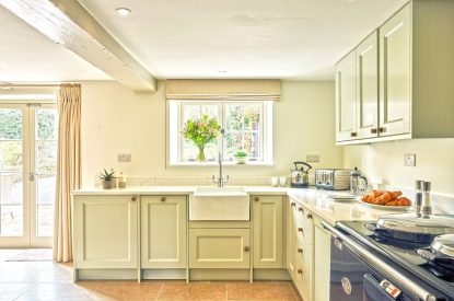 The kitchen with Aga at Walnut Coach House, Devon