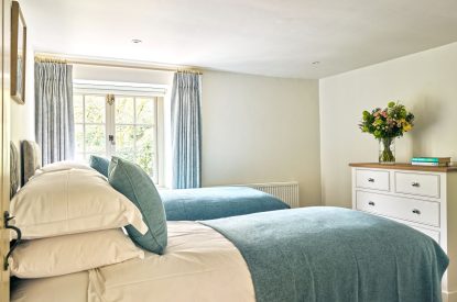 The twin bedroom at Walnut Coach House, Devon