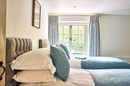 The twin bedroom at Walnut Coach House, Devon