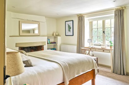 The super-king size bedroom at Walnut Coach House, Devon
