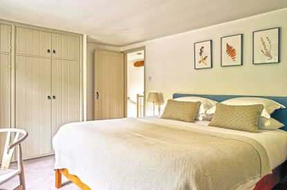 The super-king size bedroom at Walnut Coach House, Devon 