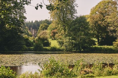 The lake surrounded by the estate gardens at The Byre, Welsh Borders