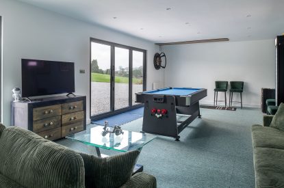 The games room at The Tractor Shed, Worcestershire