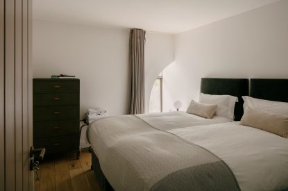 A super king-size bedroom at Crieff Tower, Perthshire