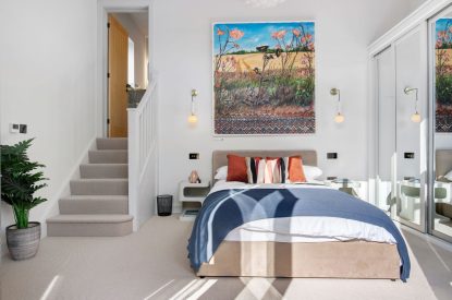 A king-size bedroom at The Wivenhoe Hideaway, Essex