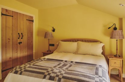 A king-size bedroom at Haymill Retreat, Powys