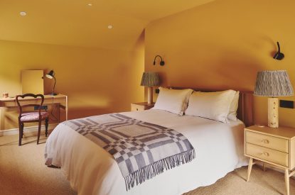 A super king-size bedroom at Haymill Retreat, Powys