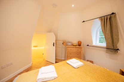 The king-size bedroom at Grimsbury Castle, Berkshire
