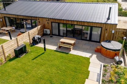The garden and hot tub at Cowfold, Devon