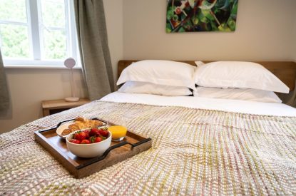A king-size bedroom at Grimsbury Castle, Berkshire