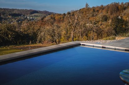 The outdoor swimming pool at Winston Manor, Cotswolds