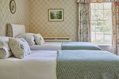 A twin bedroom at Spring House, Norfolk