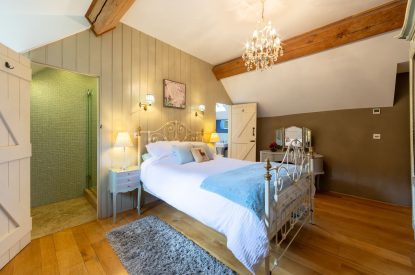 A king-size bedroom at Butterfly Cottage, Somerset