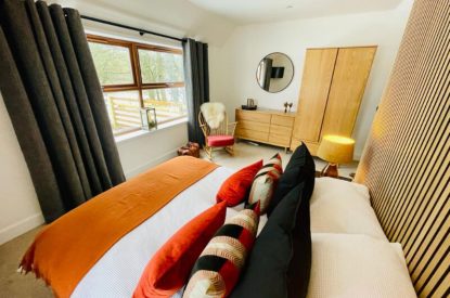 A king-size bedroom at Stag Haven, Cairngorms
