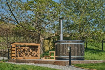 The wood-fired hot tub at Hall House, Powys