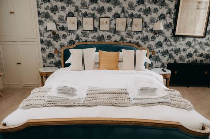A king-size bedroom at Stoke Hall, Nottinghamshire