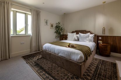 A king-size bedroom at The Meadow Retreat, Cornwall