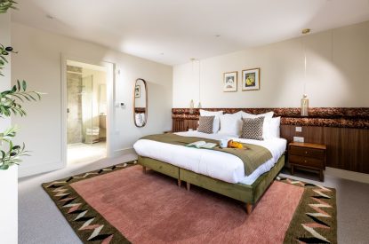 A super-king-size bedroom at The Meadow Retreat, Cornwall
