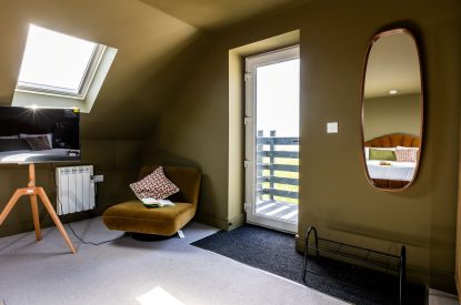 A super-king-size bedroom at The Meadow Retreat, Cornwall