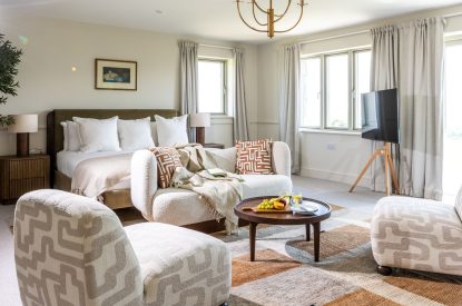 A super-king-size bedroom at The Meadow Retreat, Cornwall