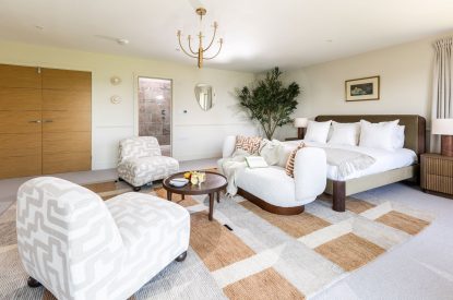 A super-king-size bedroom at The Meadow Retreat, Cornwall