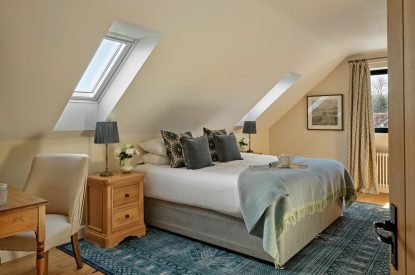 A king-size bedroom at Estate Lodge, Welsh Borders