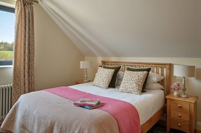 A king-size bedroom at Estate Lodge, Welsh Borders