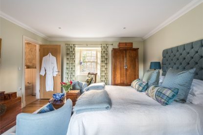 A super-king-size bedroom at Douglas Retreat, Edinburgh