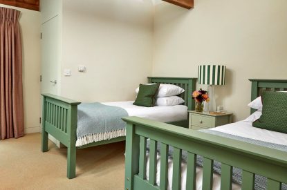 A twin bedroom at East Barn, Norfolk